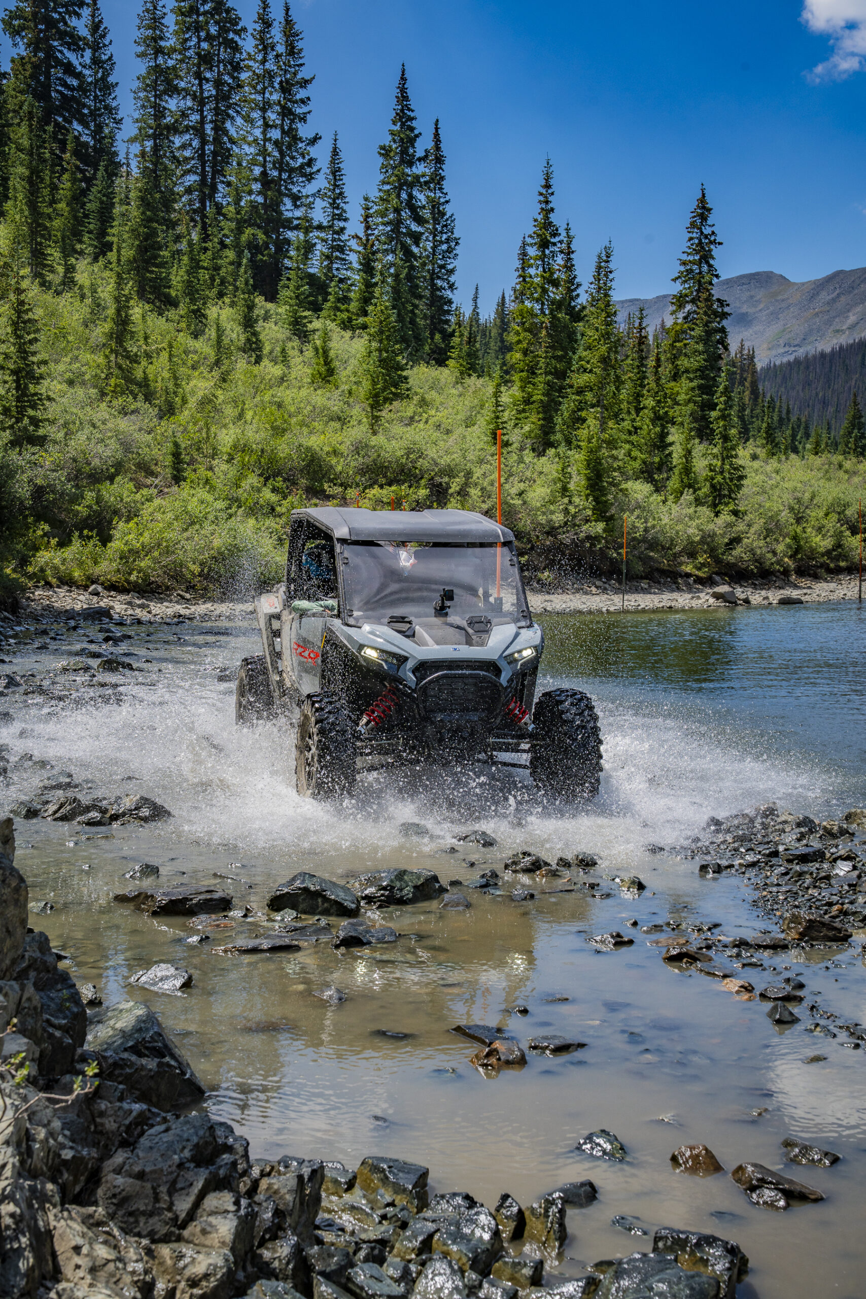 UTV passing Mirror Lake near Tin Cup Colorado